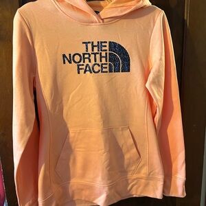 The North Face Orange Sweatshirt hoodie. Never worn.